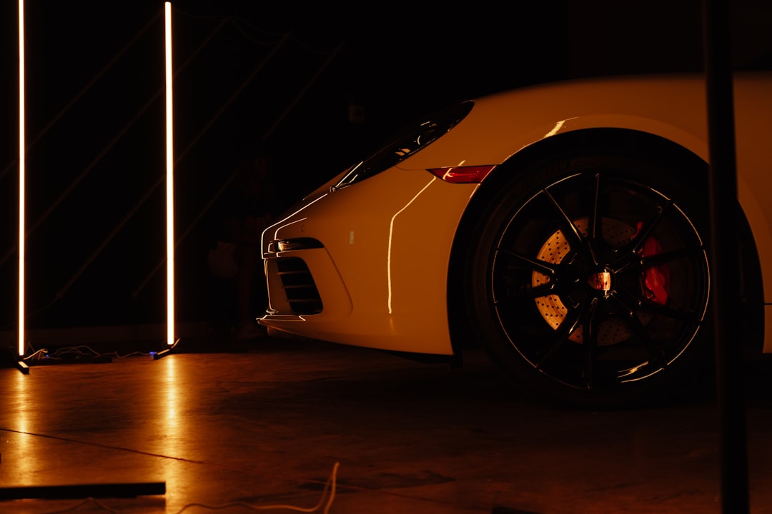 a-yellow-sports-car-parked-in-a-garage-y-6jha5rxkw